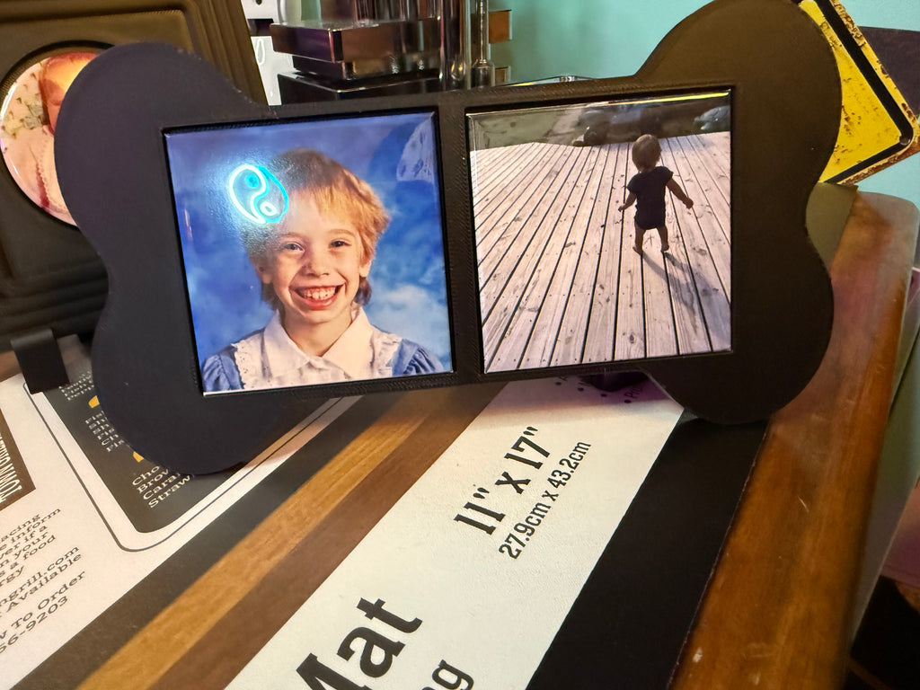 Bone shaped frame holds 2.5 inch photo magnets